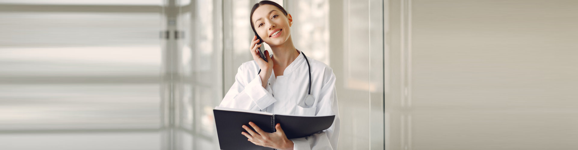 a female doctor on a phone